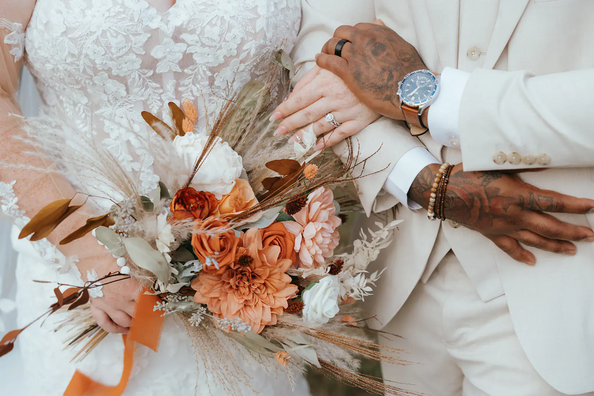 Fall wedding bouquet with a wedding rings