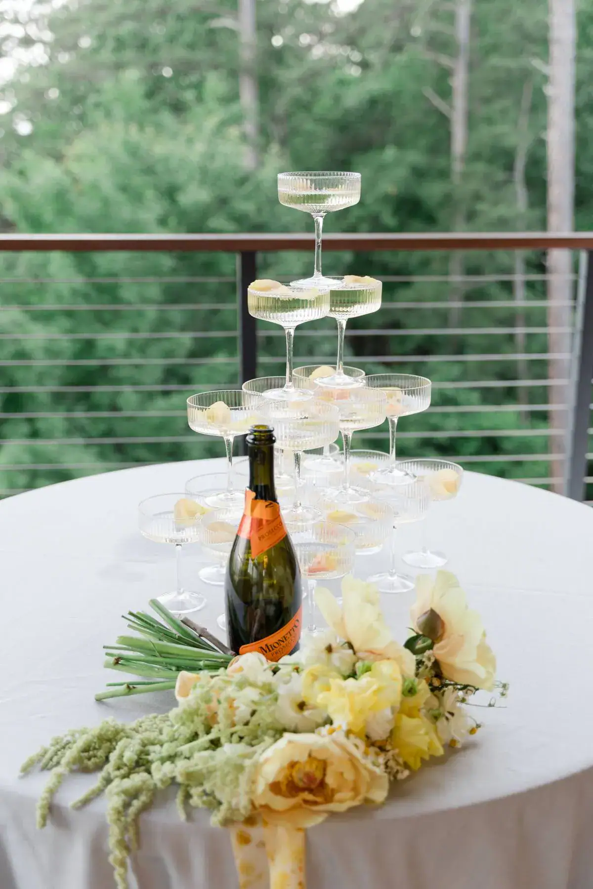 Champagne tower Couple getting married at Magnolia venue